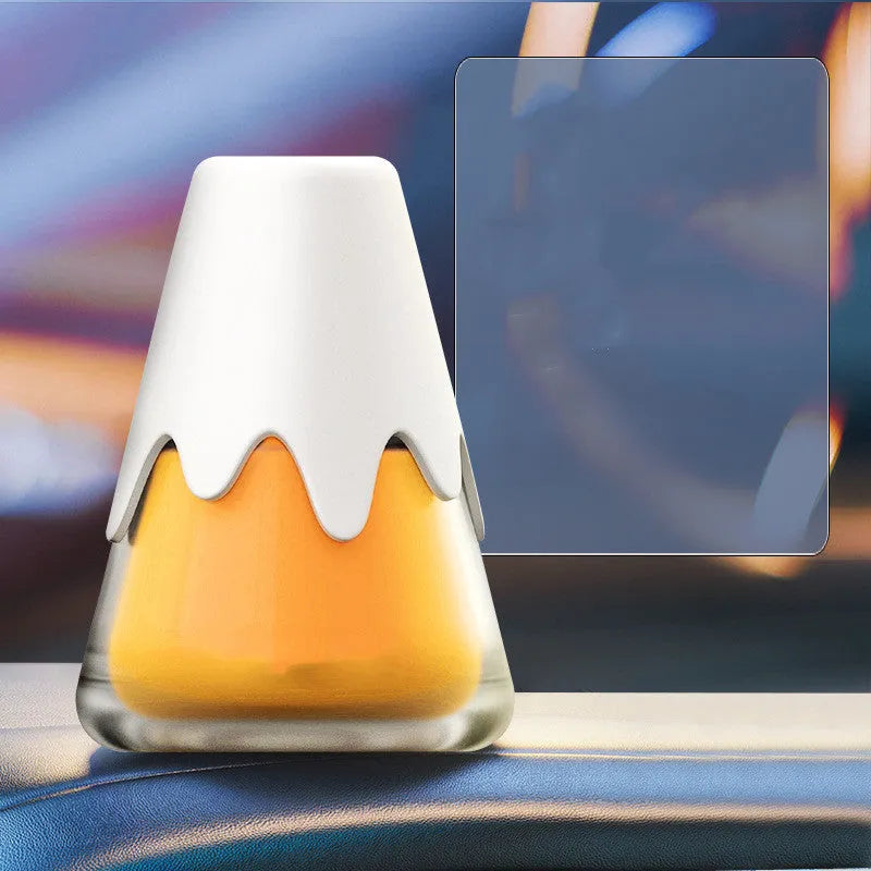 Snow Mountain Cup glass car aromatherapy unit measuring 9.1x6.9cm with four fragrance colour options