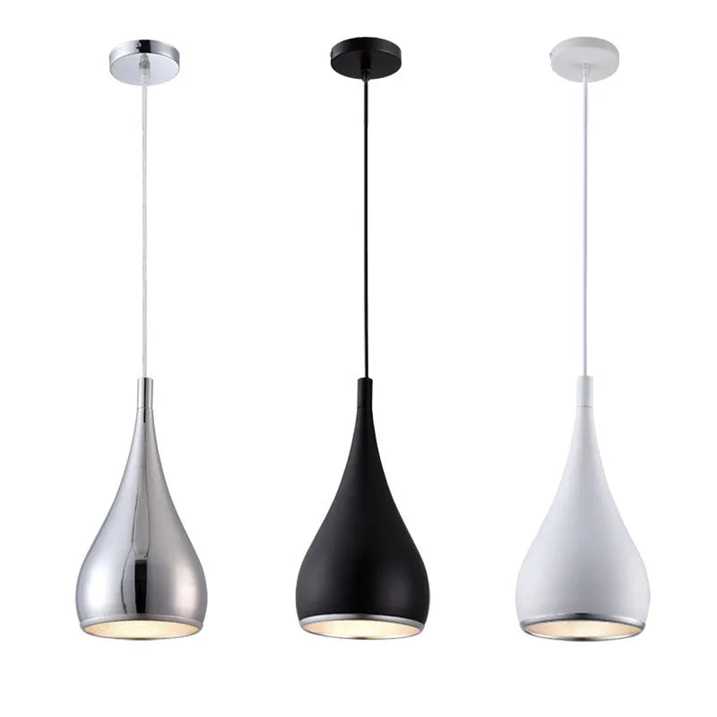 Minimalist iron chandelier in black finish with three bulb heads on a long platter base.