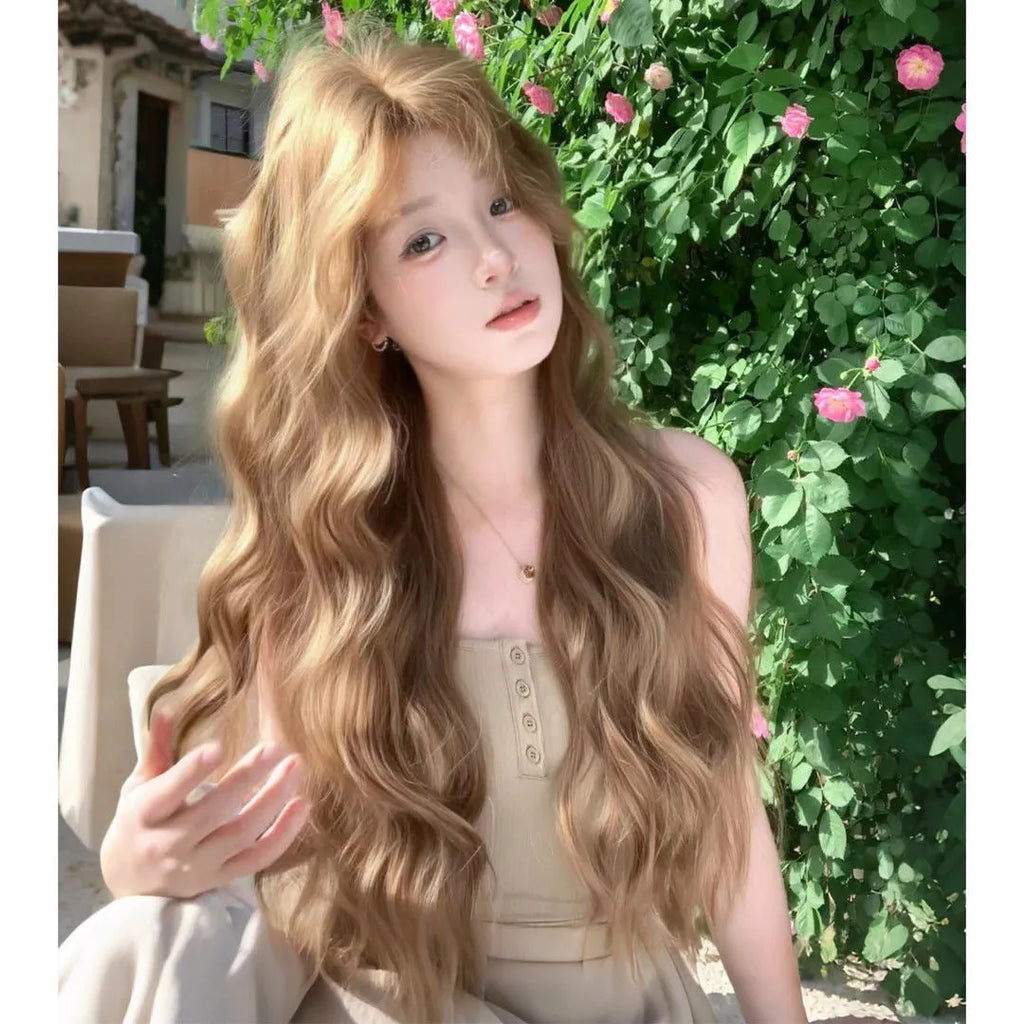 Linen brown medium-long curly synthetic wig on display stand with hair net