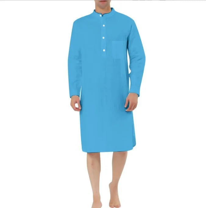 A man's simple cotton shirt robe in a light colour, shown hanging, with visible button front and pockets.
