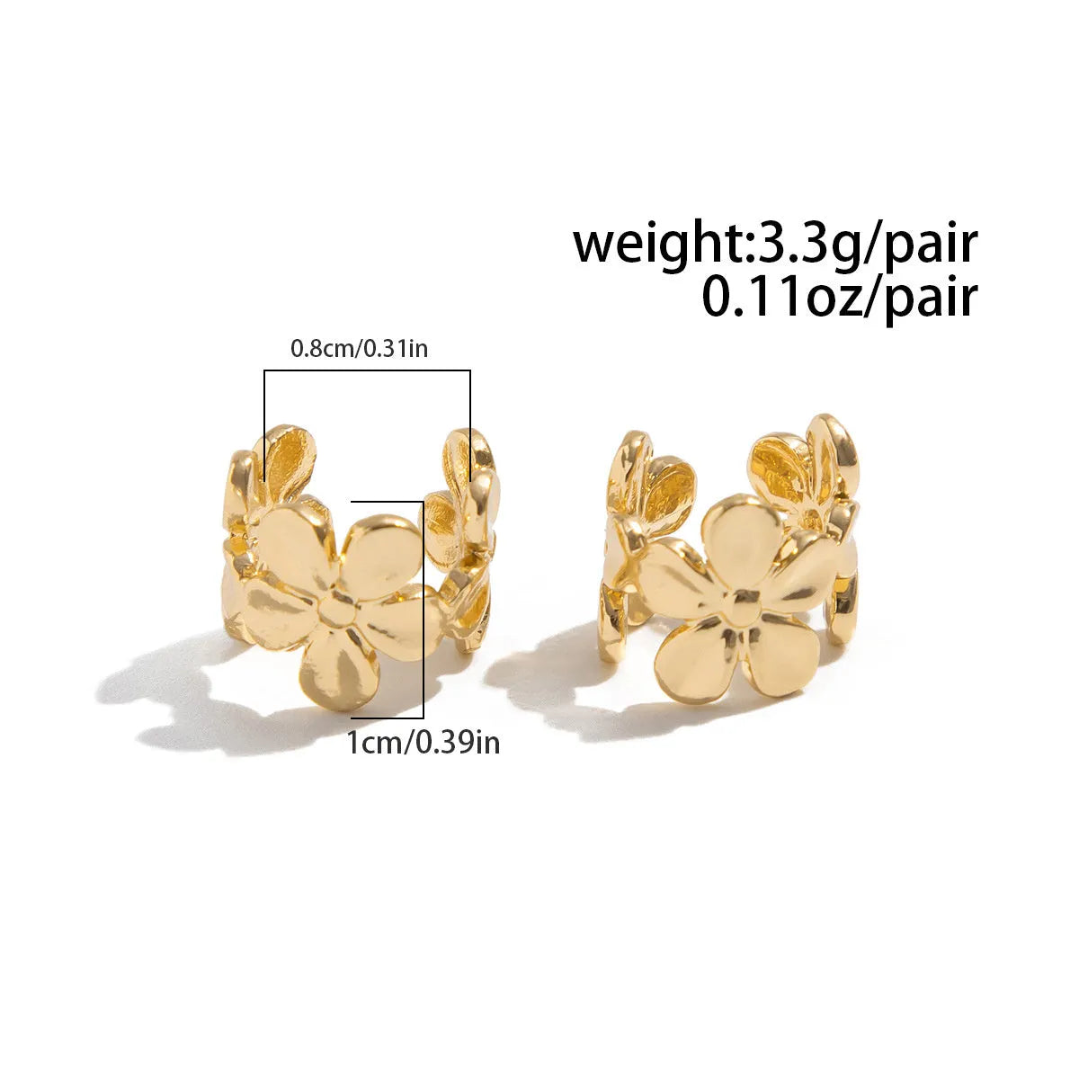 Gold-coloured alloy earrings with starfish and scallop shell designs.