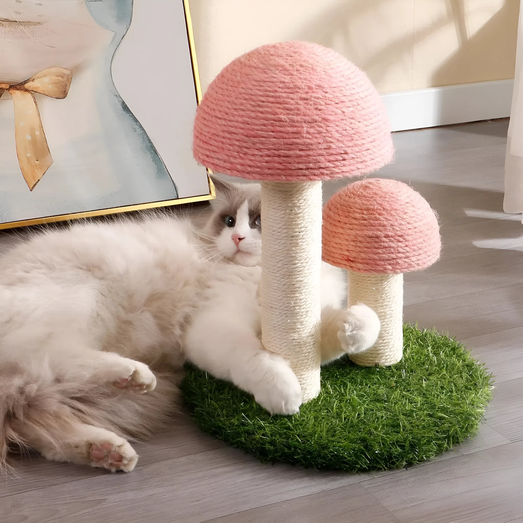 Pink mushroom-shaped cat scratching post with natural sisal covering for small cats