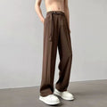 Black straight leg loose fit casual trousers on a hanger, front view.