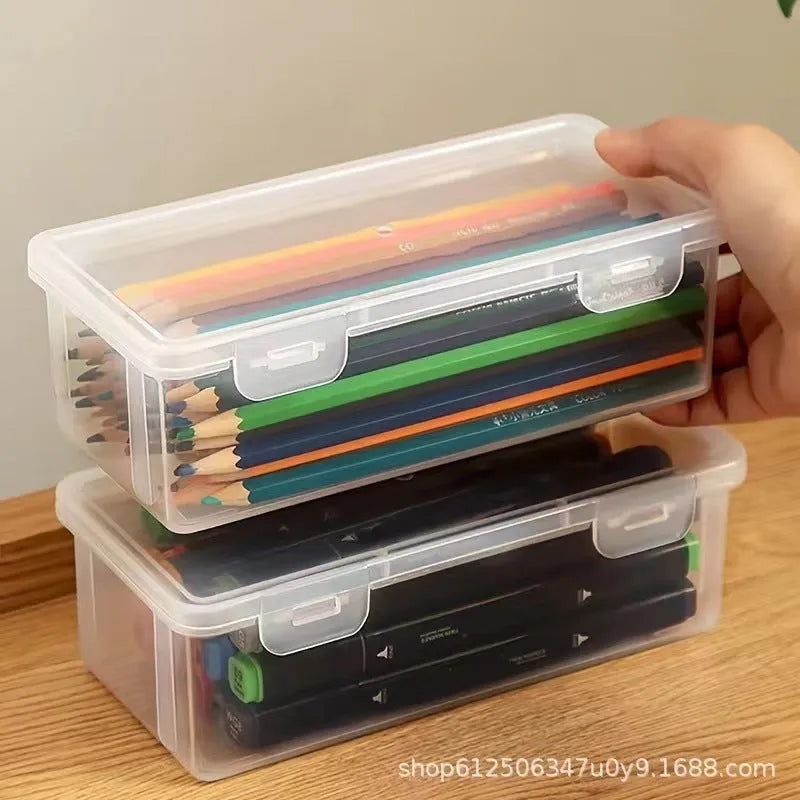 Transparent plastic pencil storage box for organising pens and drawing tools