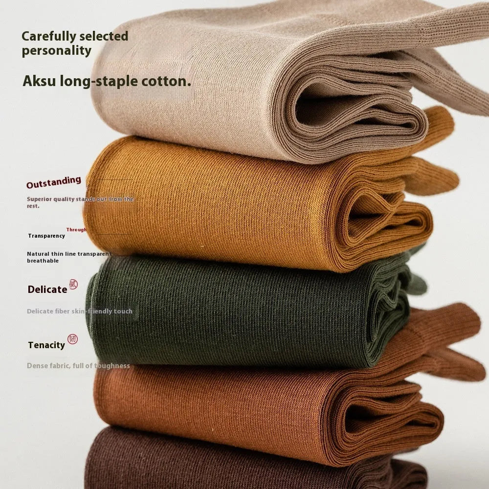 Mid-calf length men's business socks in solid colours, made from pure combed cotton.