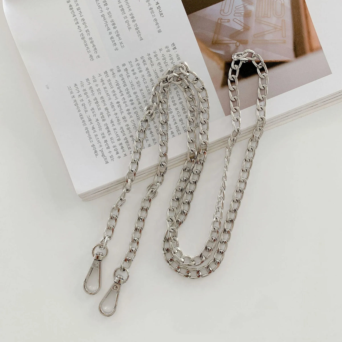 Electroplating mirror TPU phone case with animal print and attached chain for iPhone 13 Pro Max