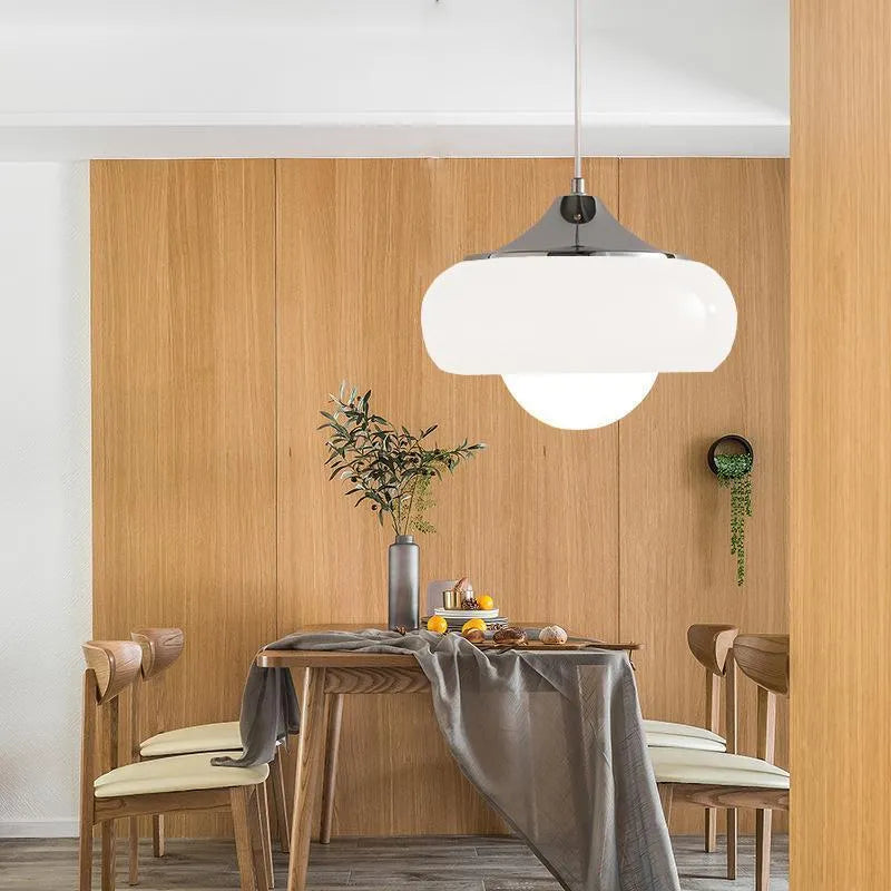 Milk white Bauhaus pendant light with three egg tart-shaped glass shades for bedroom or dining room