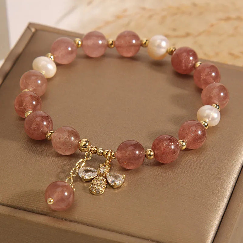 Freshwater pearl and strawberry quartz bracelet with zircon accents and bee charm
