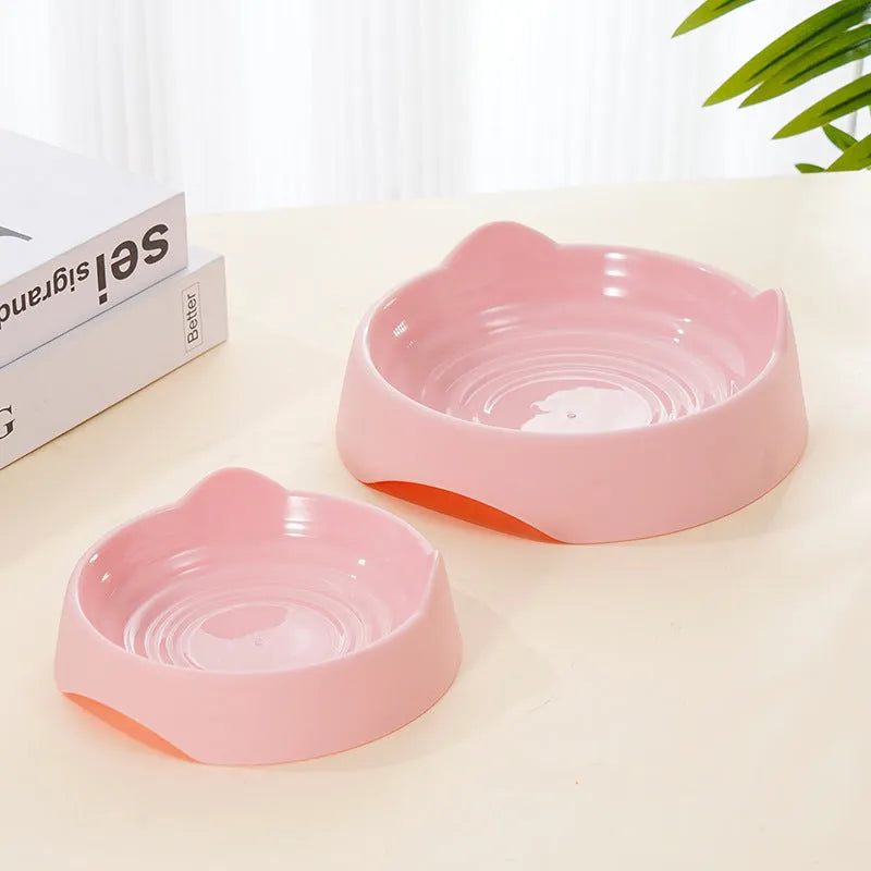 Ceramic dog slow feeder puzzle bowl in blue with non-slip base, shown in S and L sizes.