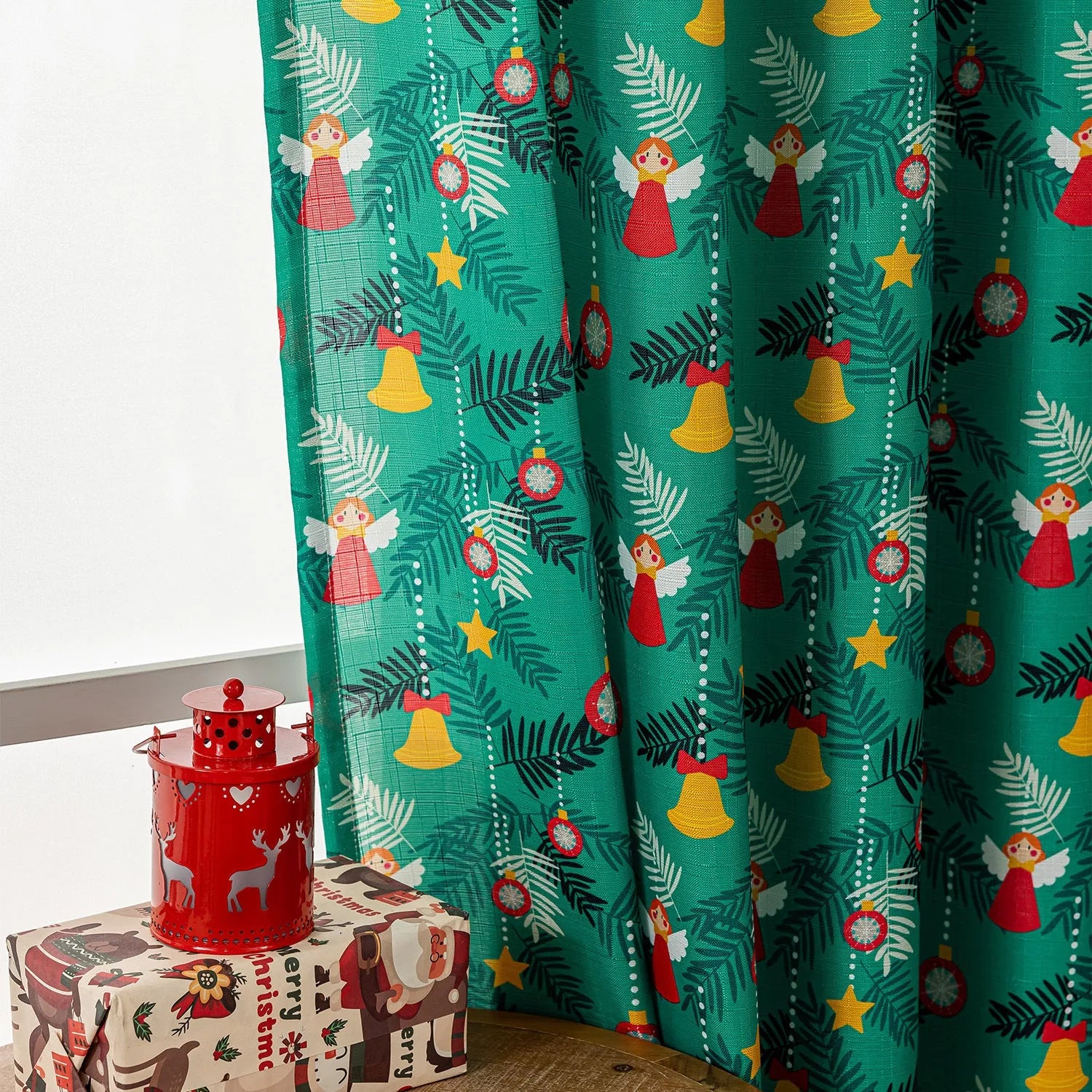 Green cloth curtain with printed cartoon snowman and angel Christmas pattern