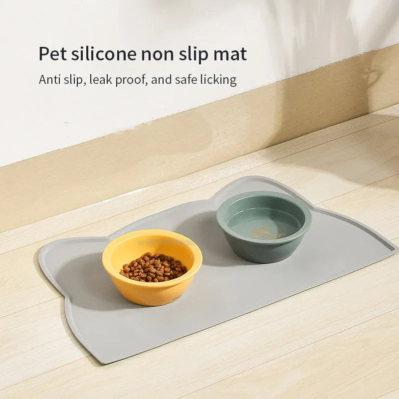 Cat head shaped silicone pet feeding mat in blue colour measuring 44x24cm