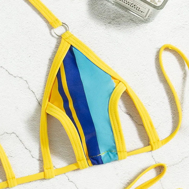 Yellow women's two-piece swimsuit with hollow neck-hanging style and backless design.