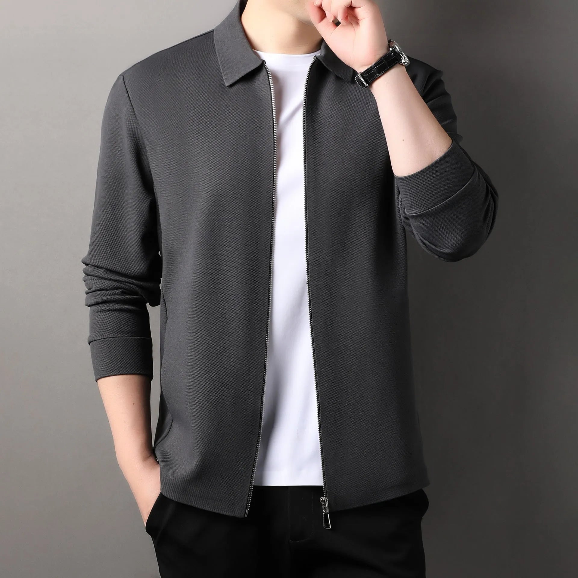 Men's polyester casual business jacket in black, dark grey, or apricot with long sleeves and straight hem.
