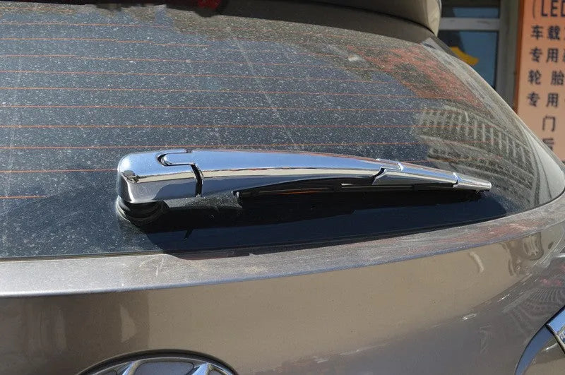 Four silvery ABS plastic rear wiper blade cover trims for a 2010 Hyundai car