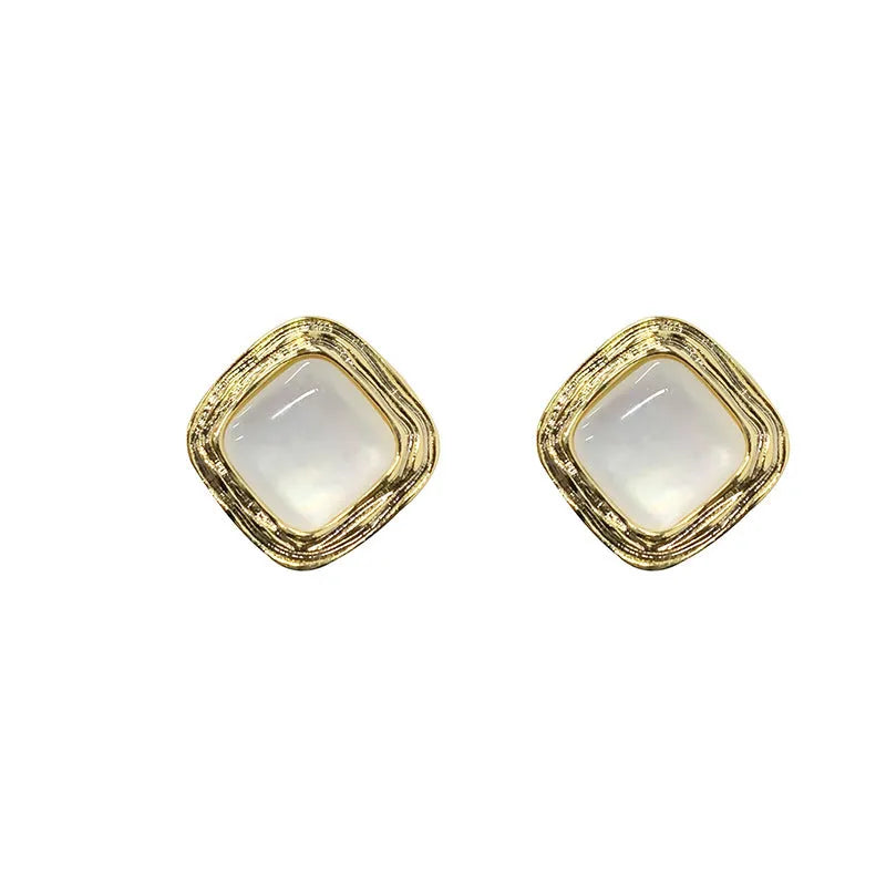 Simple geometric drop earrings made from natural shell, available in two styles, lightweight for daily wear.