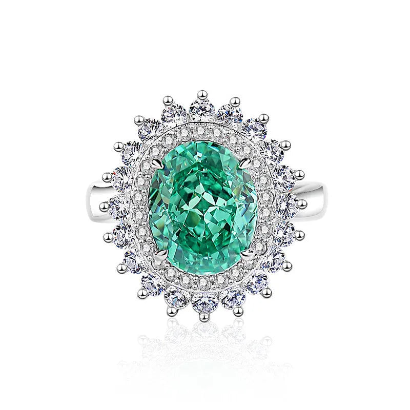 Geometric S925 silver women's ring with oval emerald, Palaibahao inlay, and high carbon diamond accent.