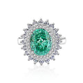 Geometric S925 silver women's ring with oval emerald, Palaibahao inlay, and high carbon diamond accent.