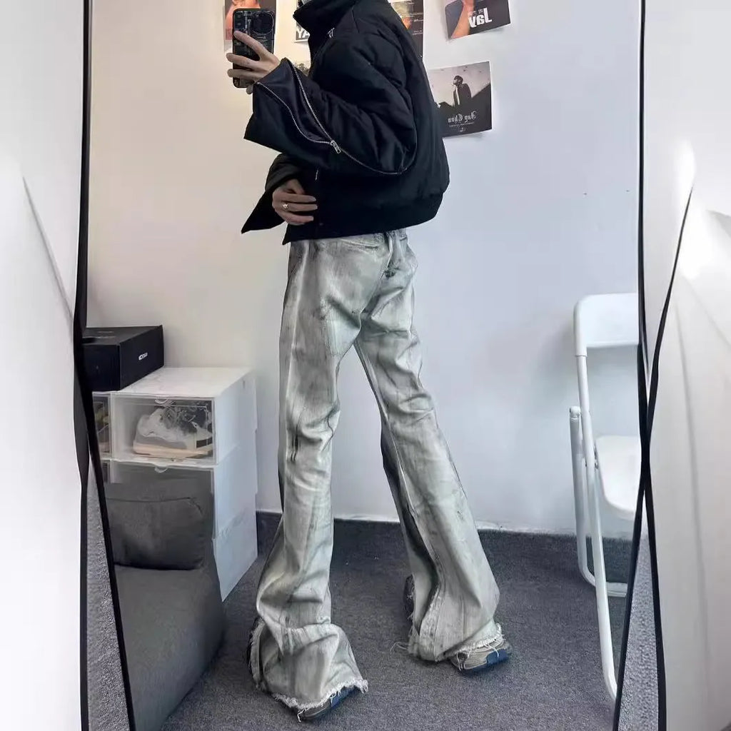White heavy rough selvedge denim jeans with black ribbon gradient detailing, mid waist, zip fly.