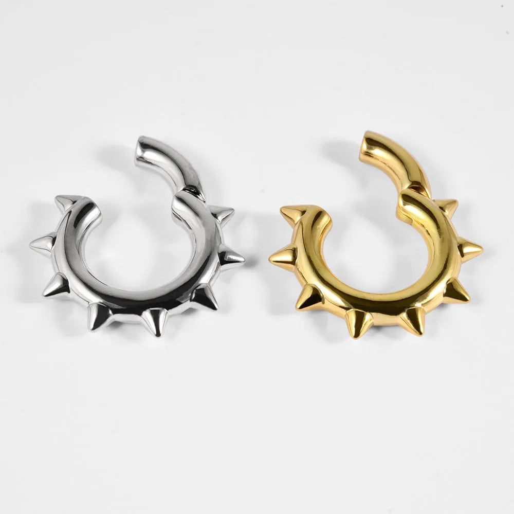 A pair of geometric cone-shaped copper ear extenders with round magnet, shown in one of eight available style colours.