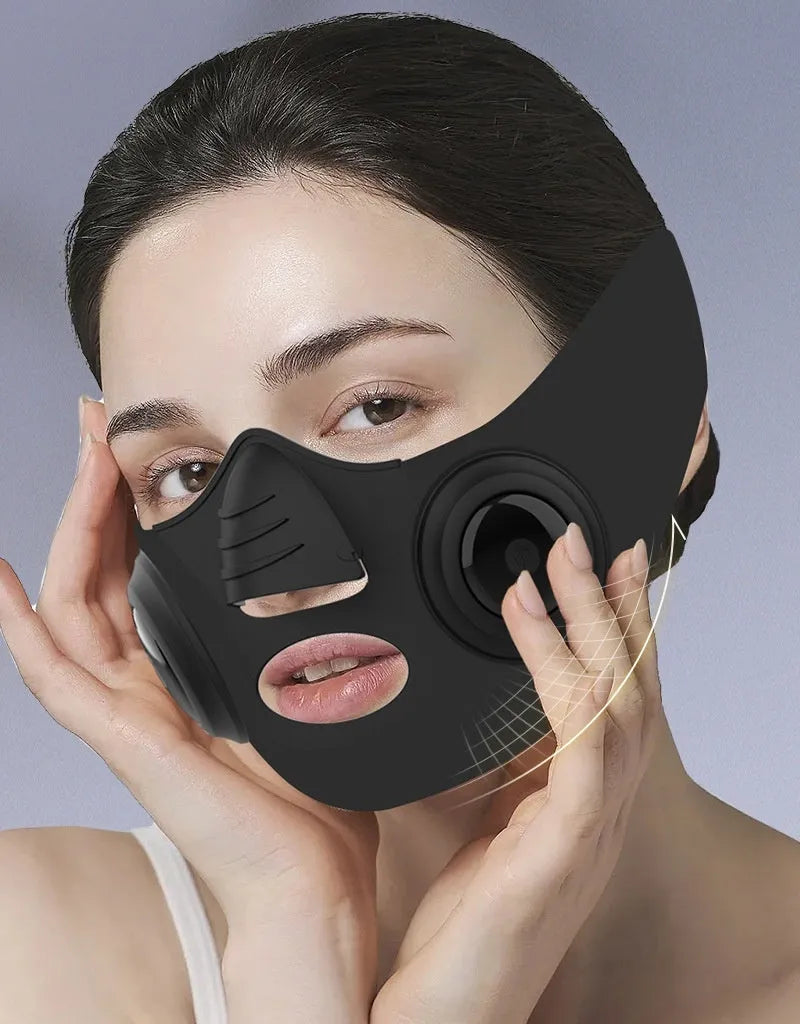Black photon facial beauty device with USB cable and a white face mask attachment.
