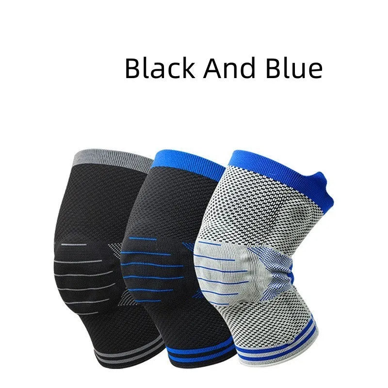 Black and gray knee pad with silicone shock absorber for sports protection on a leg.