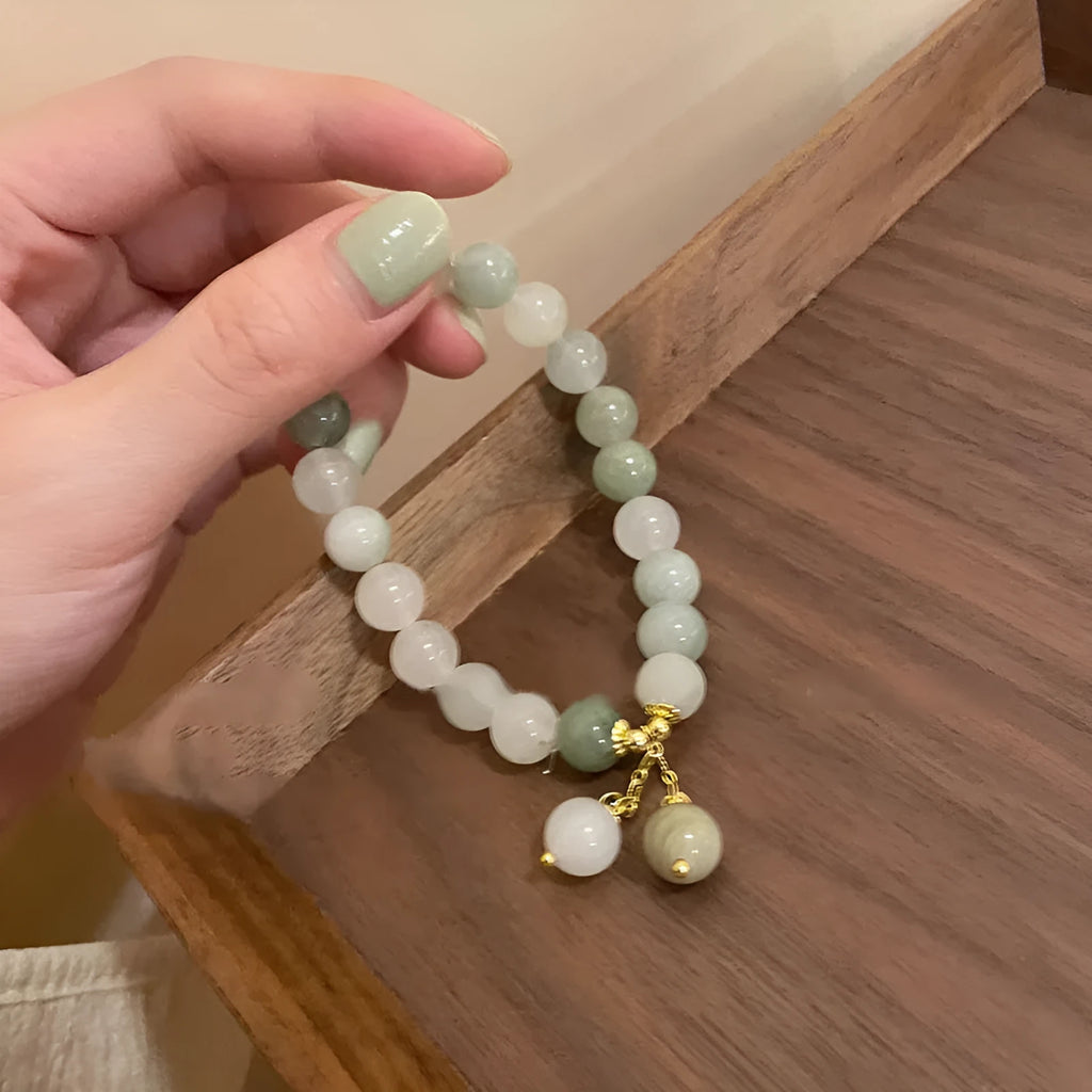 Multi-layer beaded bracelet with small rice-shaped white round beads, handmade ethnic style for women