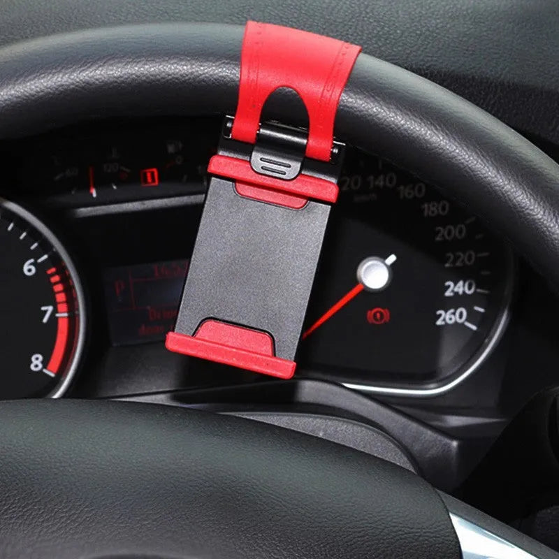 Black universal car steering wheel clip mount holding a mobile phone.