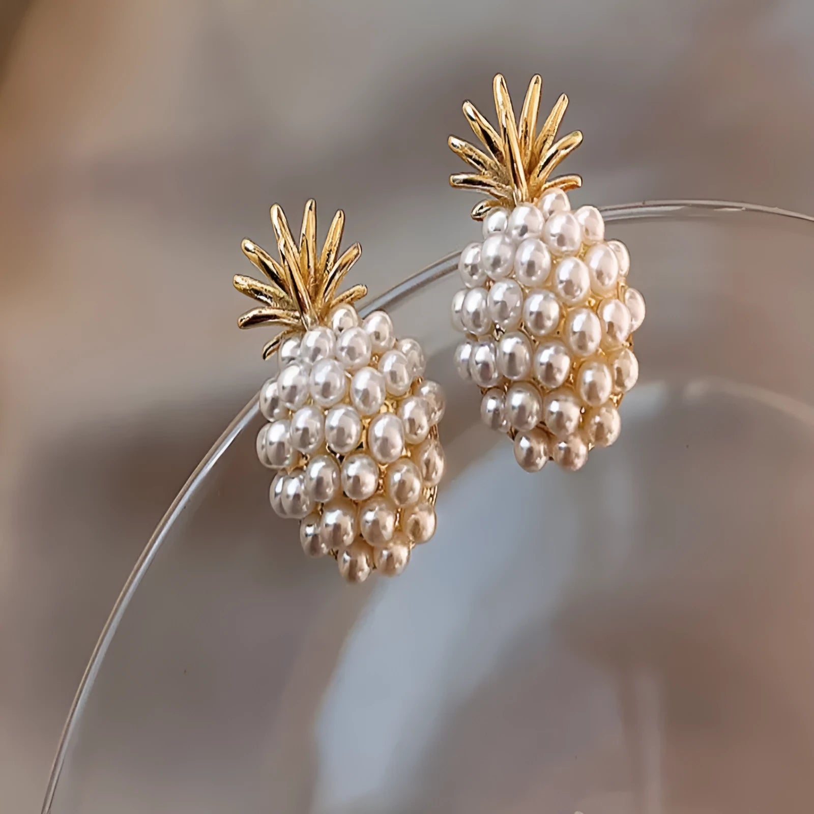 Korean style pineapple and starfish pearl drop earrings in alloy with electroplated finish