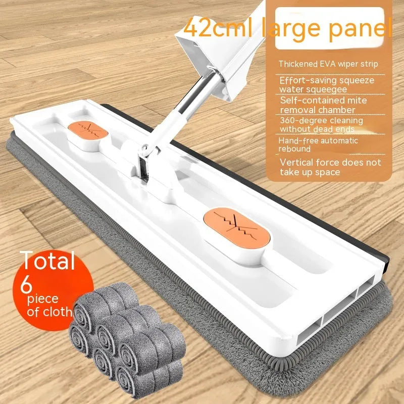 Large flat mop with stainless steel handle and blue mop cloth on hard floor