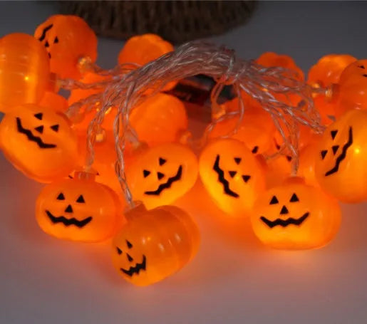 Halloween LED string lights with pumpkin, ghost, bat and spider pendants on a 1.2 metre battery-powered string
