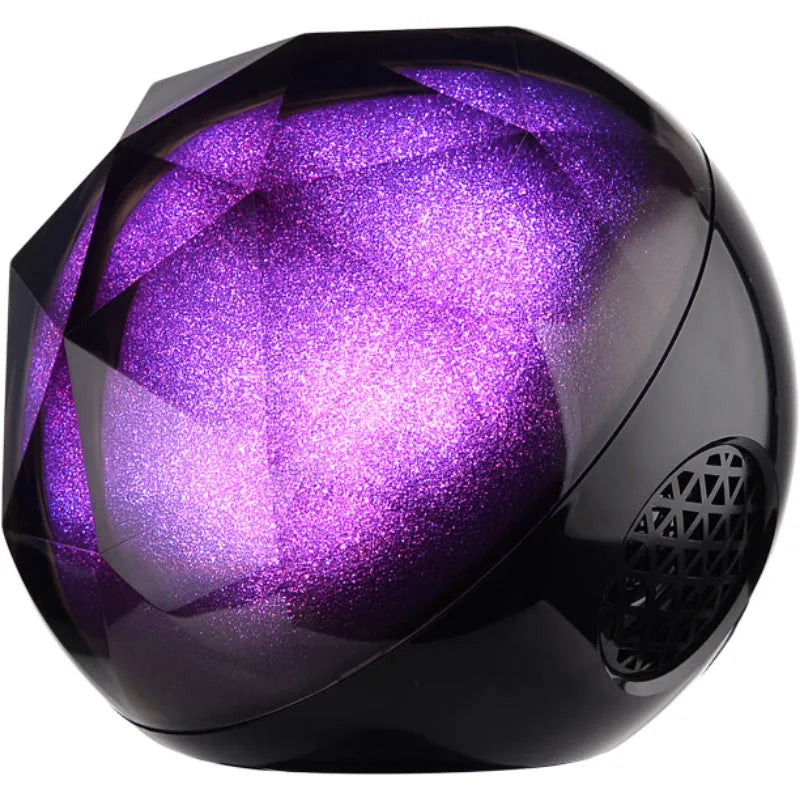 Compact LED seven-color Bluetooth speaker magic ball with colour-changing lights on a plain background