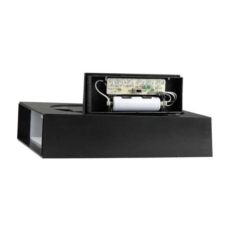 Solar powered white LED house number light with IP65 waterproof rating mounted on a wall.