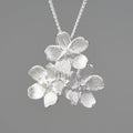 Hand-designed Myosotis Sylvatica flower sterling silver pendant with gold or silver electroplated finish.