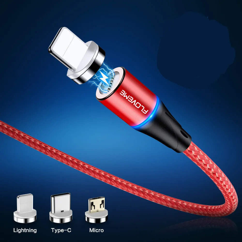 Black magnetic fast charge data cable with illuminated side lights and interchangeable connectors on a table.