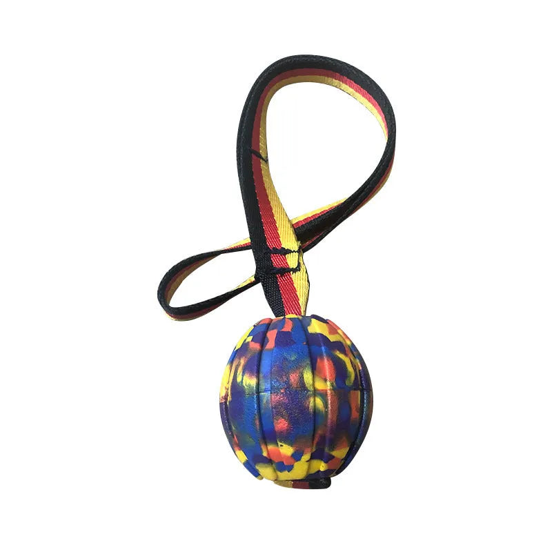 Yellow and camouflage coloured EVA foam floating tetherball dog toys in three different sizes on a blue background.