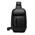 Black square-shaped outdoor shoulder bag with a single adjustable strap, shown with open zipper revealing internal laptop and phone pockets.