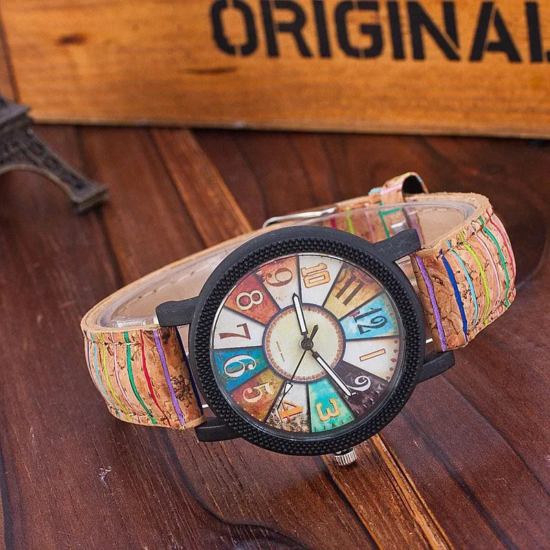 Casual vintage women's watch with brown leather strap and silver 37mm round dial.