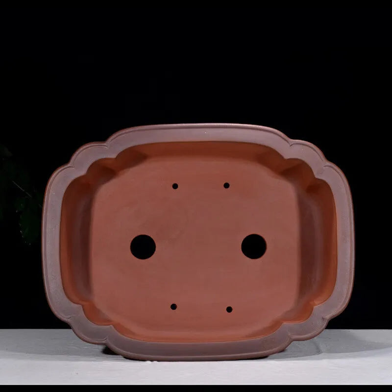 Large antique-finish purple clay Chinese style garden flower pot showing its size and deep planting cavity.