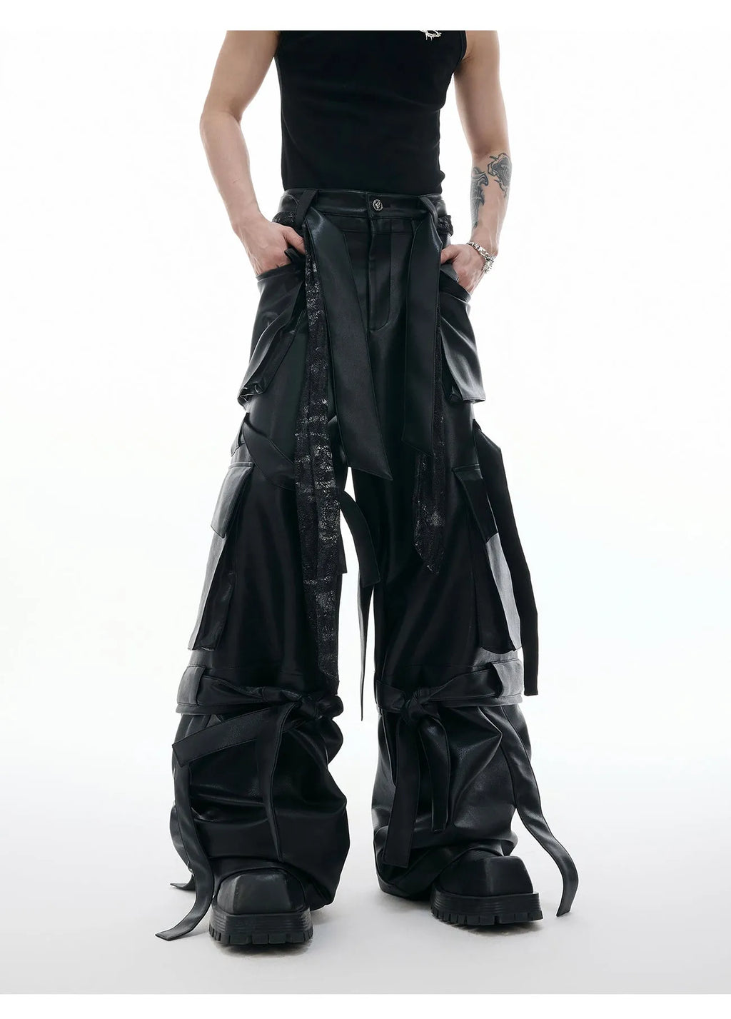 Black loose-fit quilted trousers with multiple pockets and retro stitching detail.