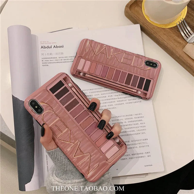 Silicone iPhone case in flesh colour with an abstract eye shadow pattern design on the back.