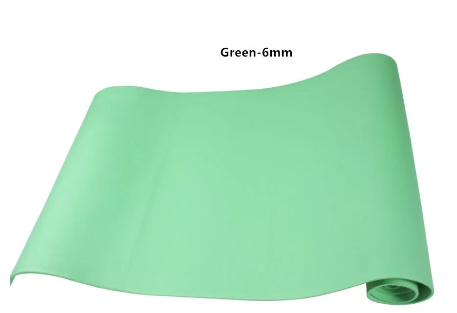 EVA foam yoga mat in blue, showing textured anti-slip surface, with a black OPP storage bag beside it.