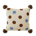 Blue cartoon anime print decorative sofa cushion pillow on a grey sofa.