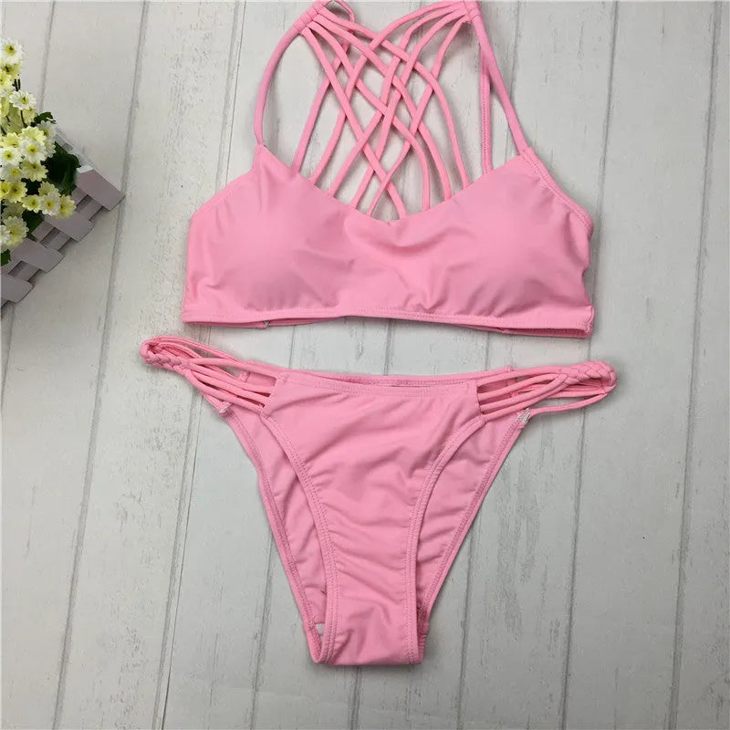 Cut out bikini set in pink or black with halter neck and cross detail, sizes S M L