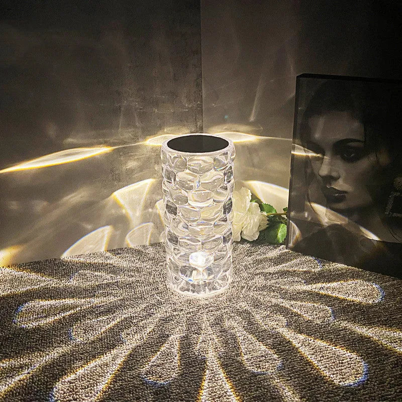 Crystal table lamp teardrop shape rechargeable night light with acrylic shade and touch control on bedside table creating warm glow