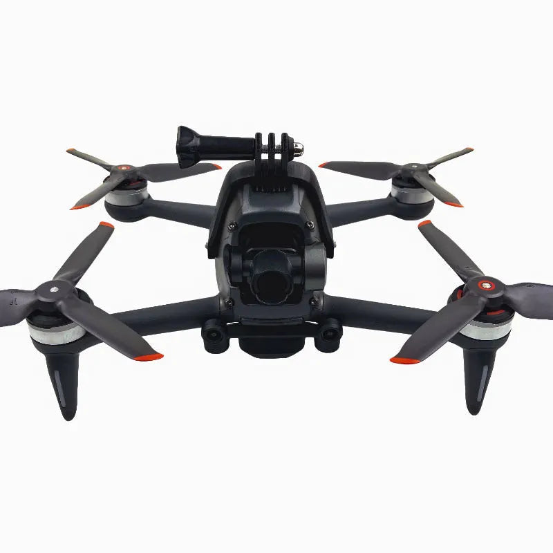 3D printed hard plastic expansion bracket with sponge padding for top-mounting GoPro cameras on FPV drones.
