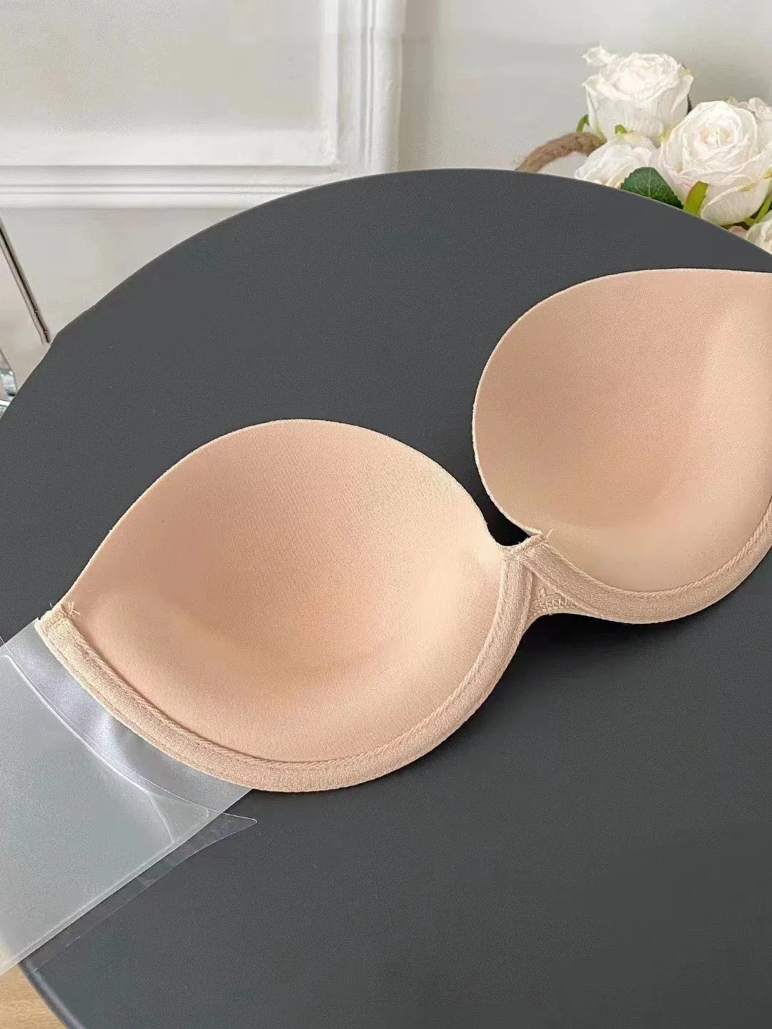 Strapless invisible back push-up bra in skin colour with moulded cup and steel ring