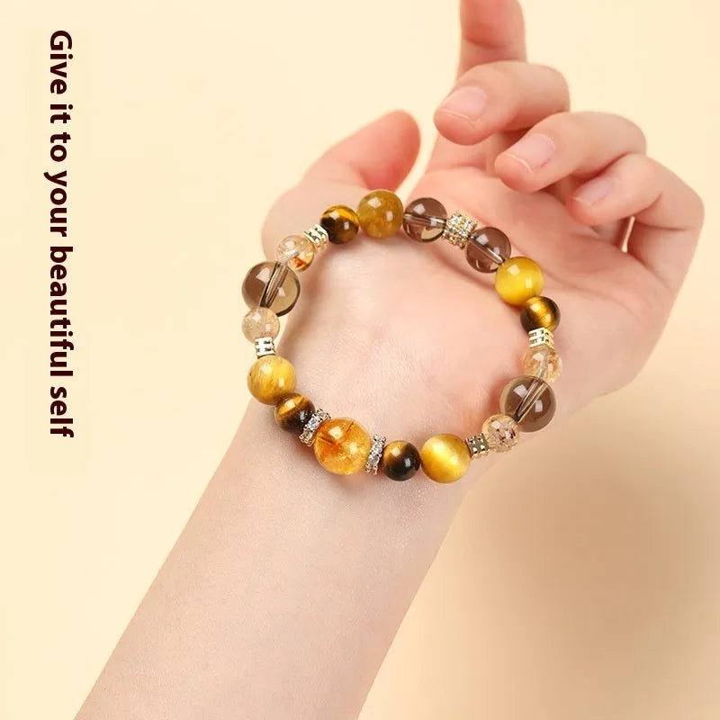 Lucky Jinba natural yellow tiger-eye crystal bracelet with geometric beads, shown in 10MM and 12MM size options.