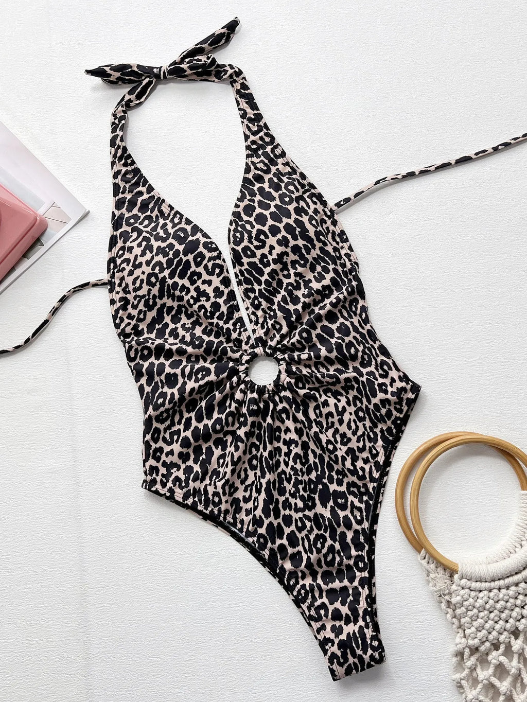 Leopard print women's one-piece swimsuit with hollow-out ring detail showing front view