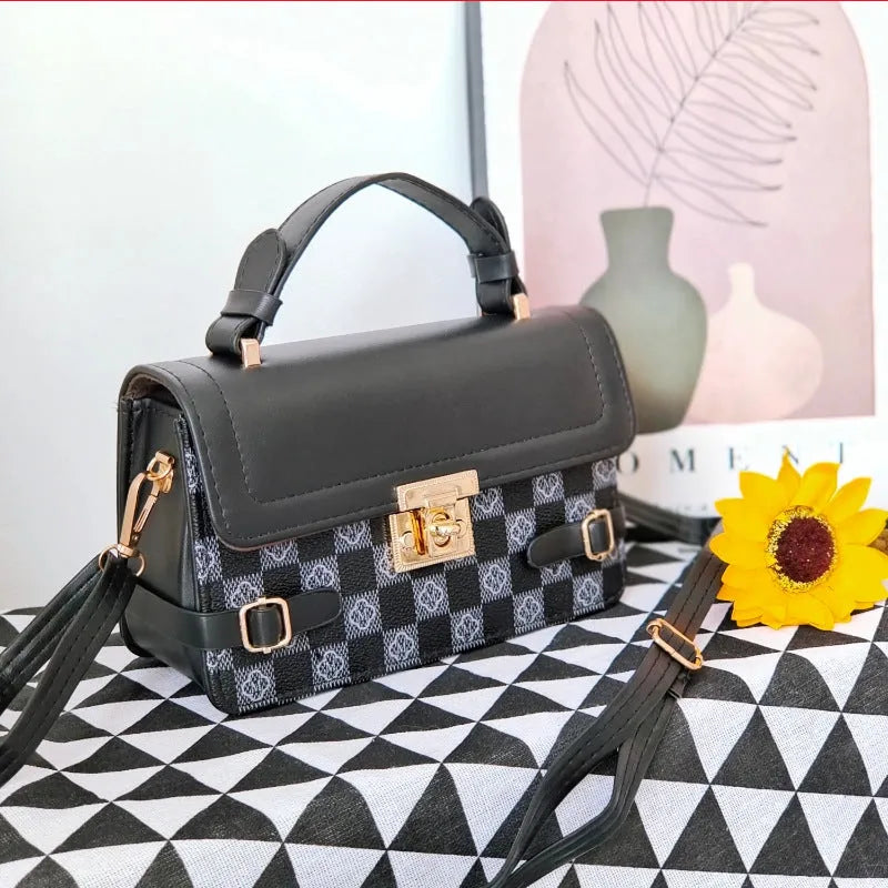 Retro patterned PU leather crossbody bag in a horizontal square shape on a white background.