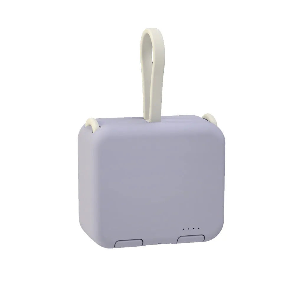Handbag back clip power bank with flip-out phone stand, shown in blue, green, red, and white colour options.